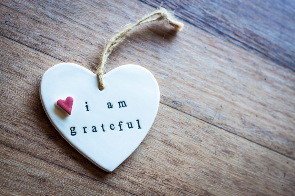 Heart engraved with the words: I am grateful. Pexels stock photo. 