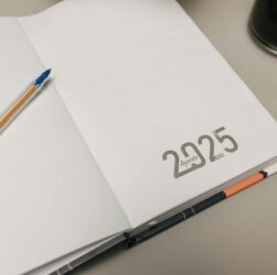 2025 agenda notebook with a pencil