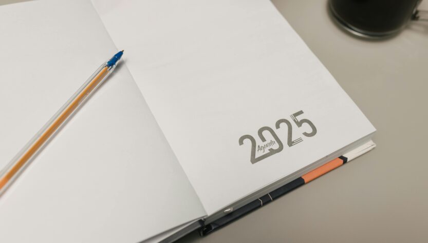 2025 agenda notebook with a pencil