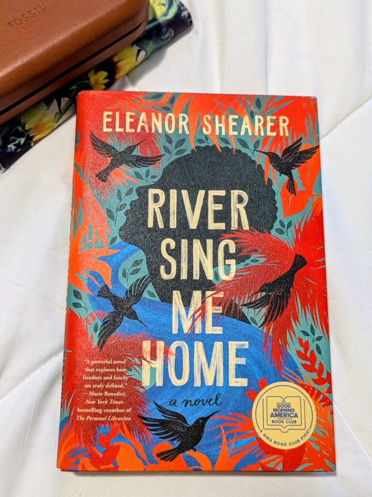 Flat lay of River Sing Me Home by Eleanor Shearer